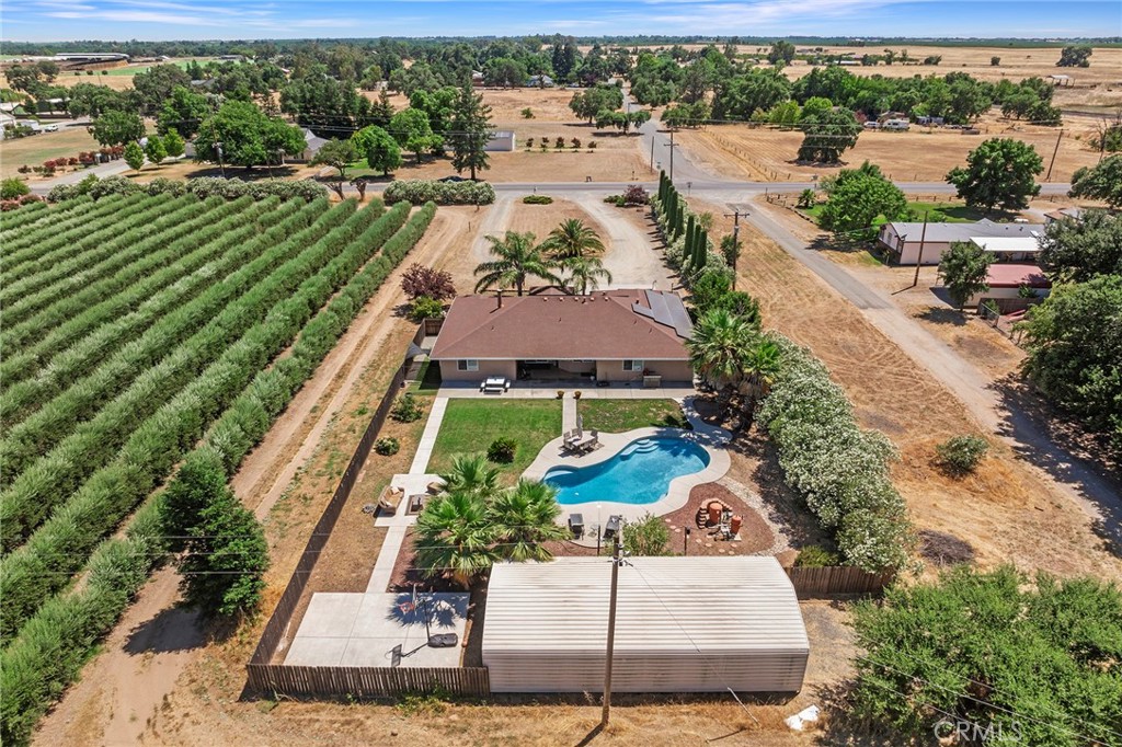 23446 Capay Road Corning, CA 96021 - Photo 54 of 64 an aerial view of a house with a garden