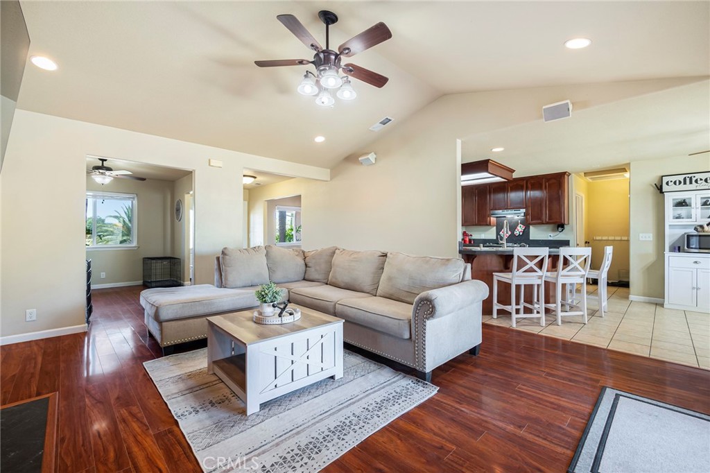 23446 Capay Road Corning, CA 96021 - Photo 10 of 64 a living room with furniture and wooden floor