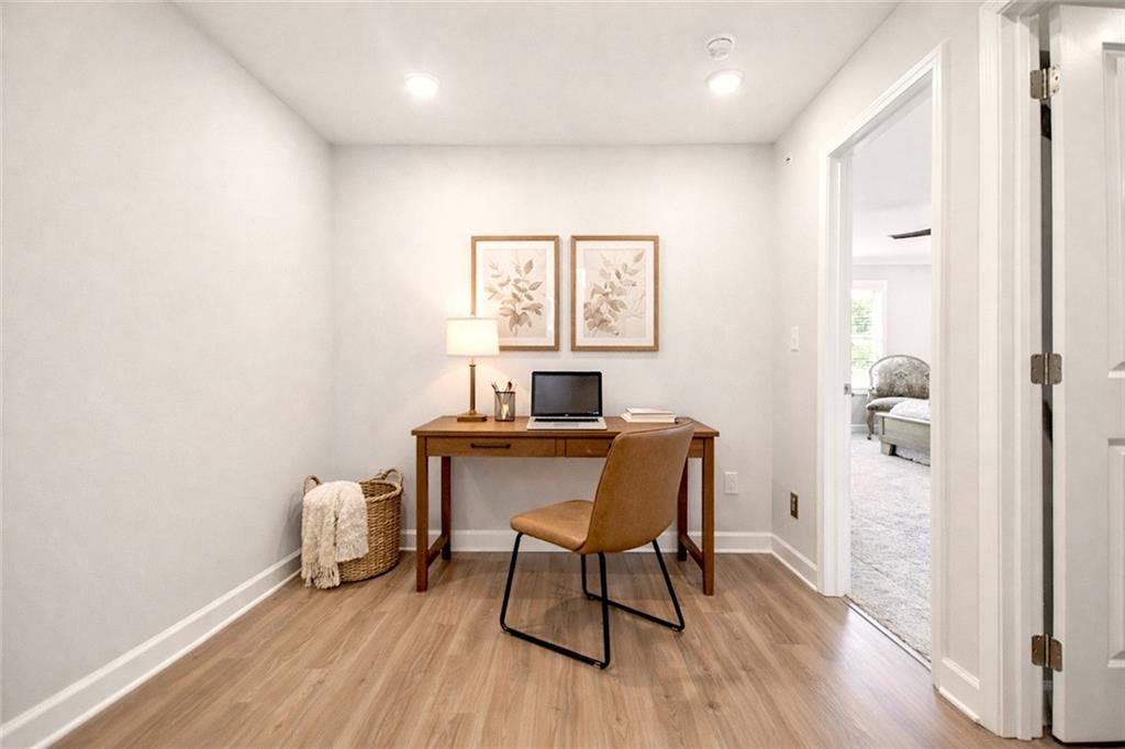 765 Trevett Way Marietta, GA 30066 - Photo 17 of 46 a workspace with furniture and wooden floor