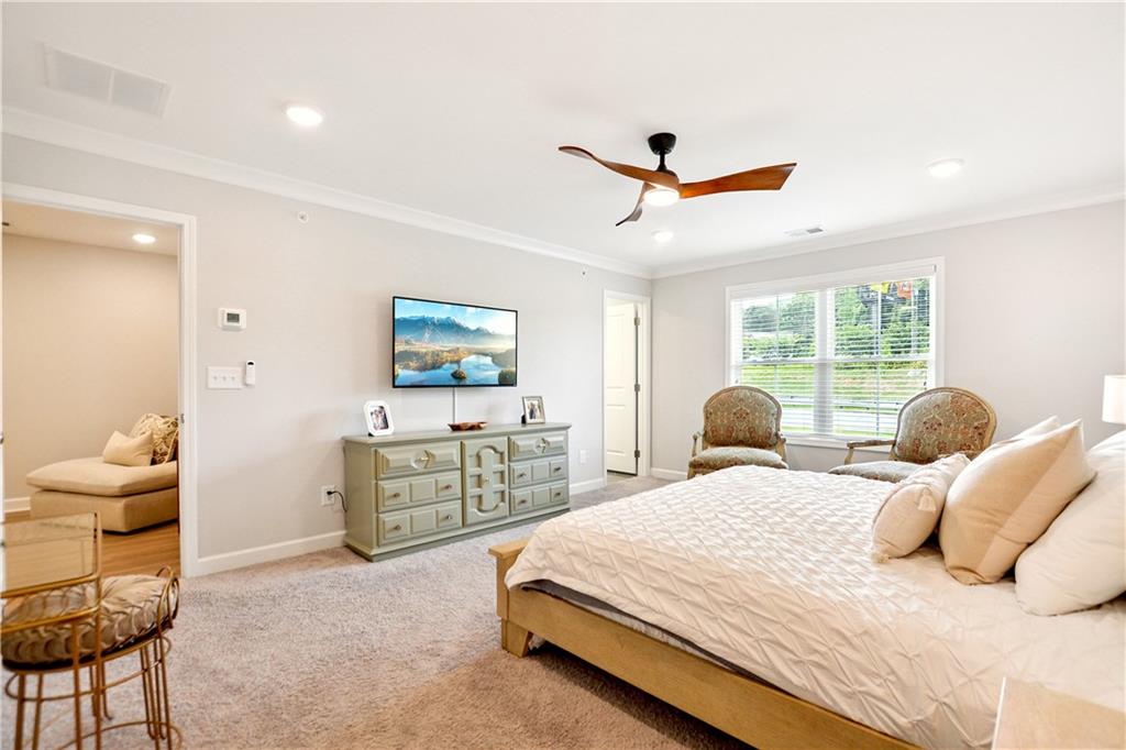 765 Trevett Way Marietta, GA 30066 - Photo 22 of 46 a bedroom with a bed and furniture