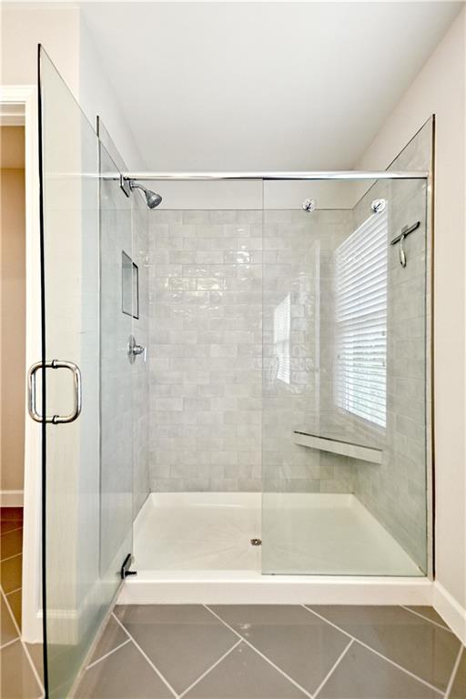 765 Trevett Way Marietta, GA 30066 - Photo 27 of 46 a bathroom with a shower and a bath tub