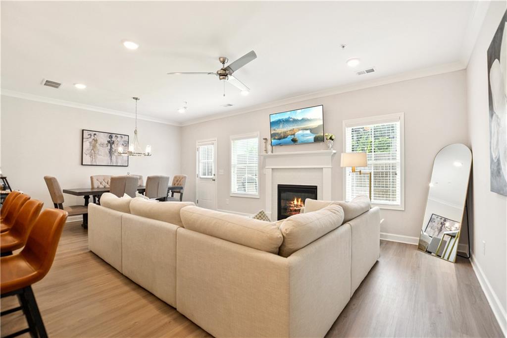 765 Trevett Way Marietta, GA 30066 - Photo 8 of 46 a living room with furniture and a fireplace