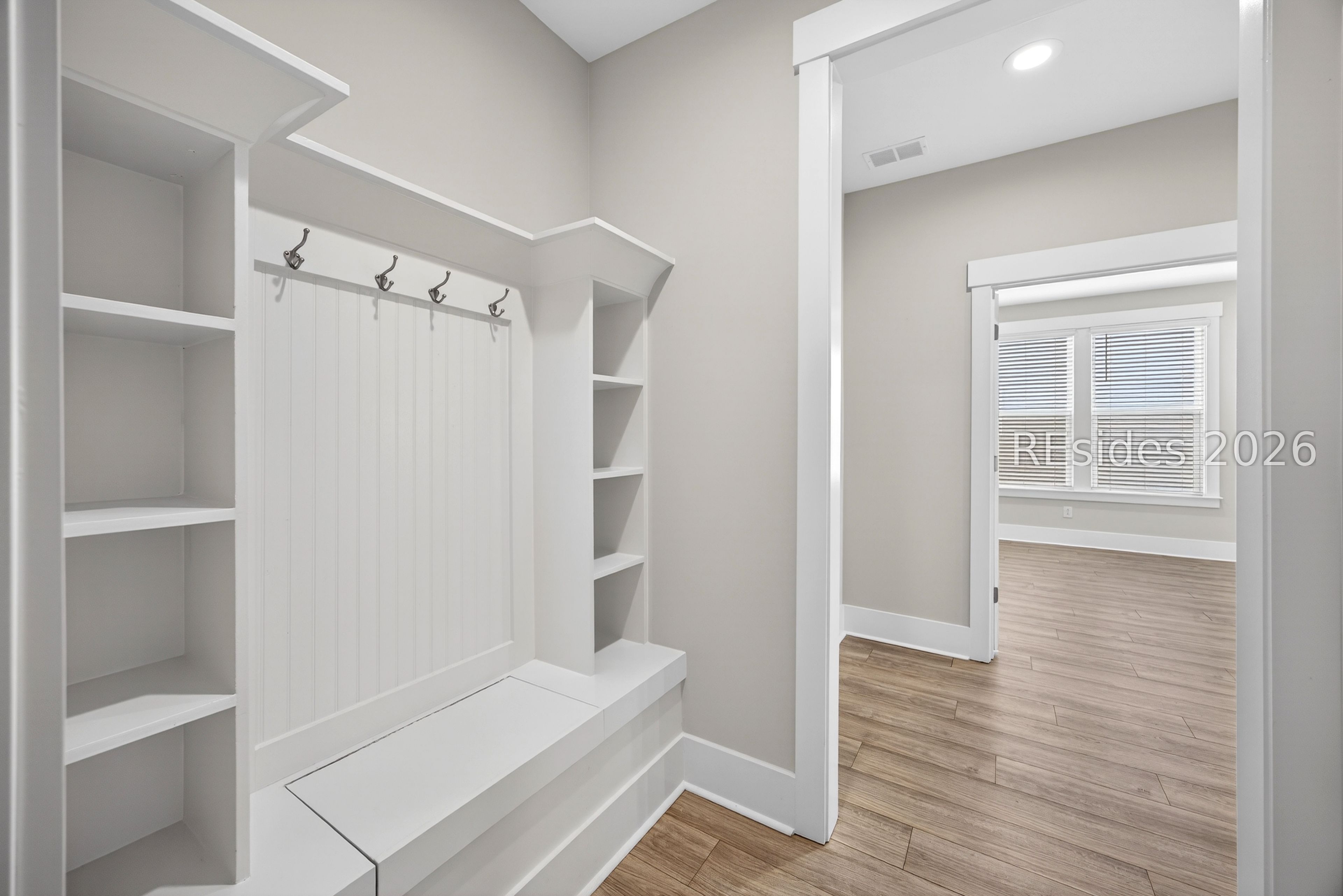 539 Sunfish Way Bluffton, SC 29909 - Photo 43 of 70 Entry from Garage with drop zone storage & bench