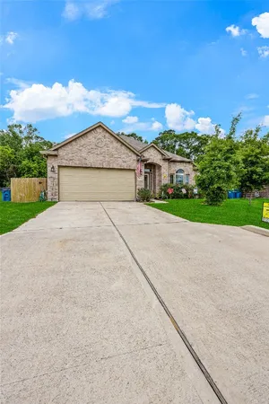 a view of house with outdoor space and street view