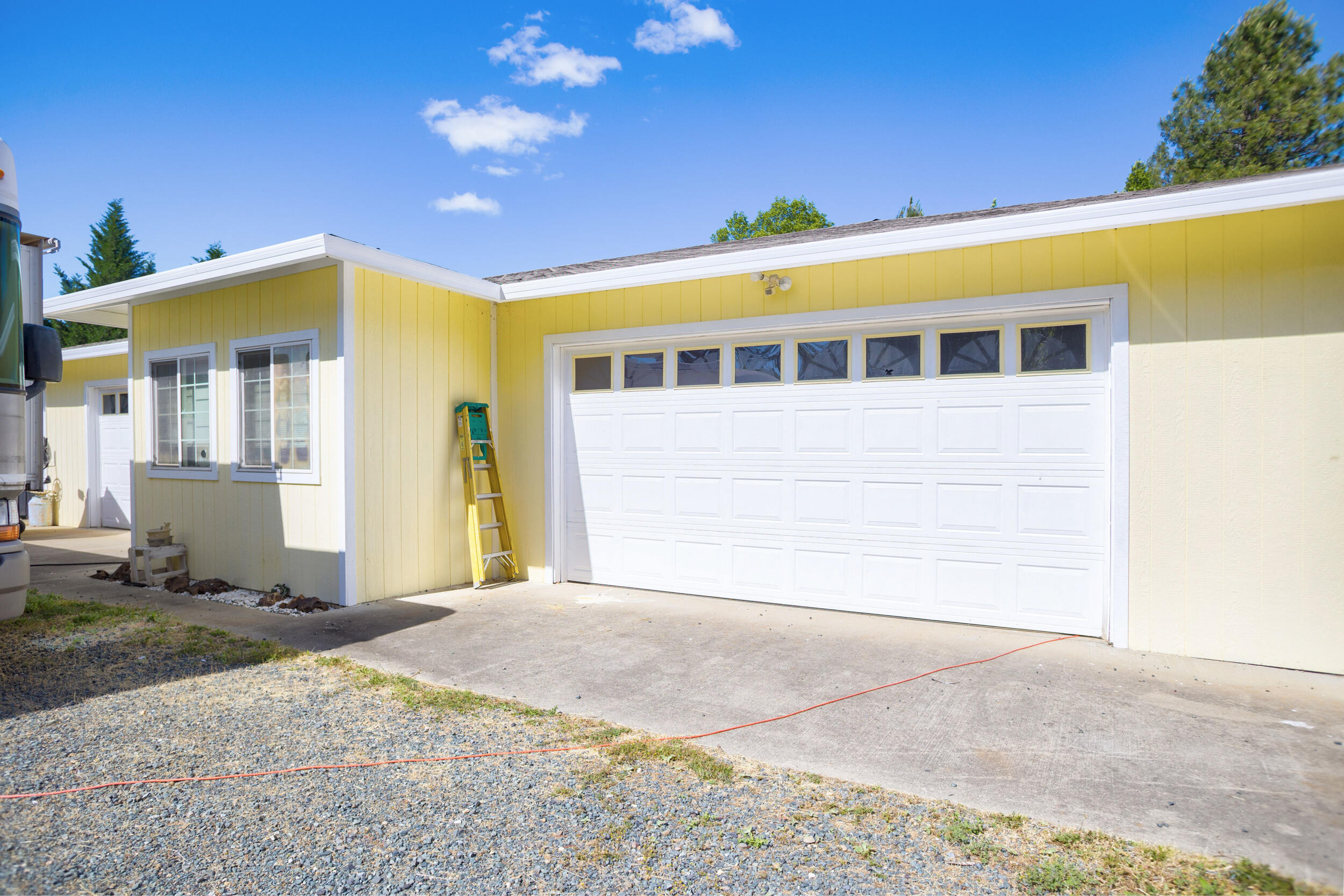 255 Queens Branch Road Rogue River, OR 97537 - Photo 4 of 60 a view of a house with a backyard