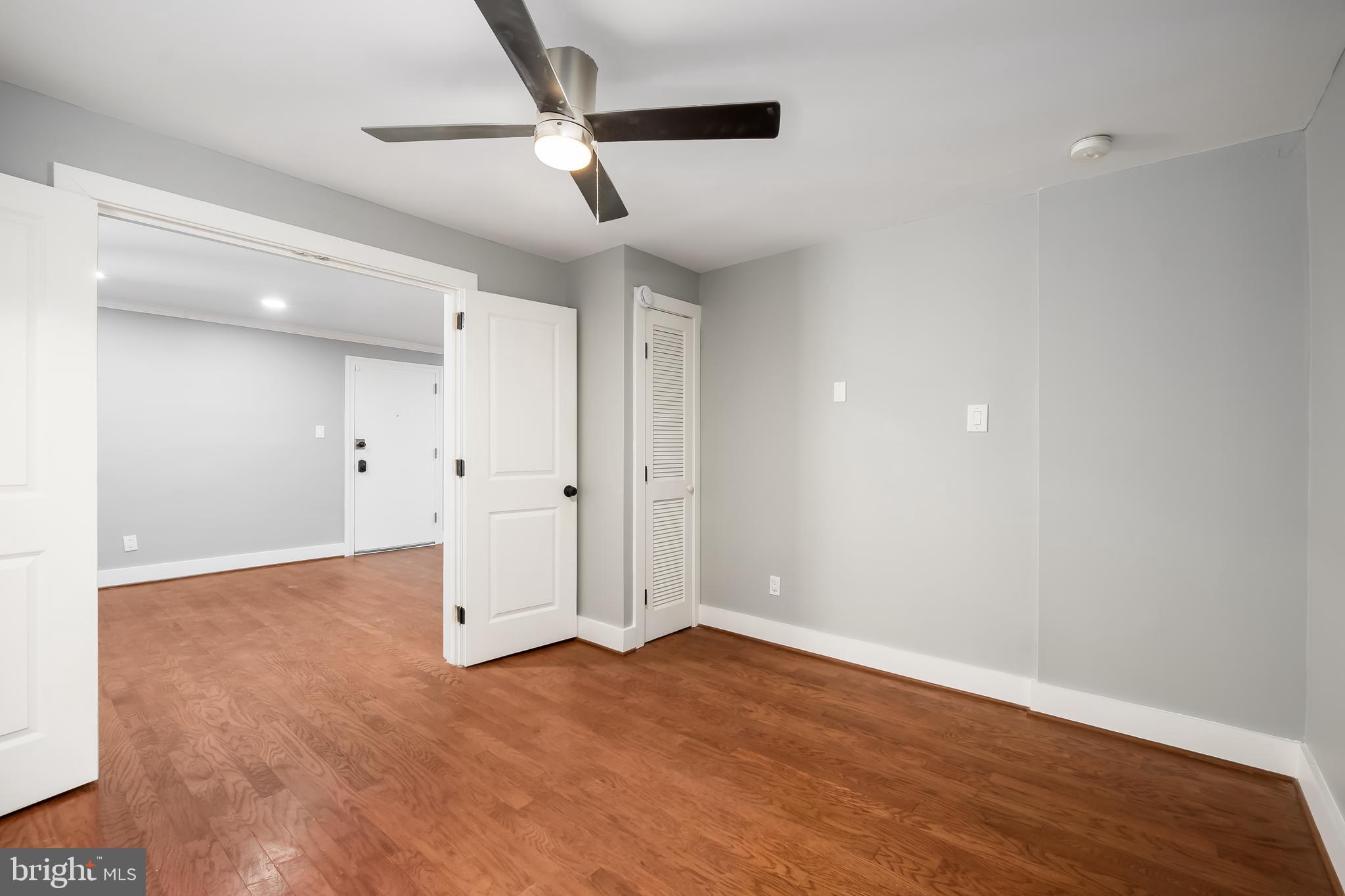 4840 MacArthur Boulevard Northwest, Unit 307 Washington, DC 20007 - Photo 17 of 21 wooden floor in an empty room