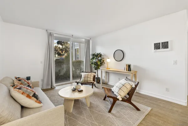 a living room with furniture and window