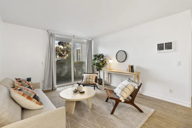 a living room with furniture and window