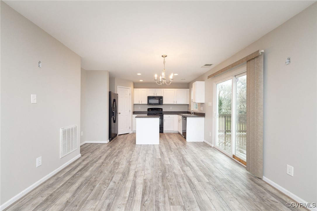 5125 Glenbeigh Road Richmond, VA 23234 - Photo 13 of 40 a view of kitchen with wooden floor