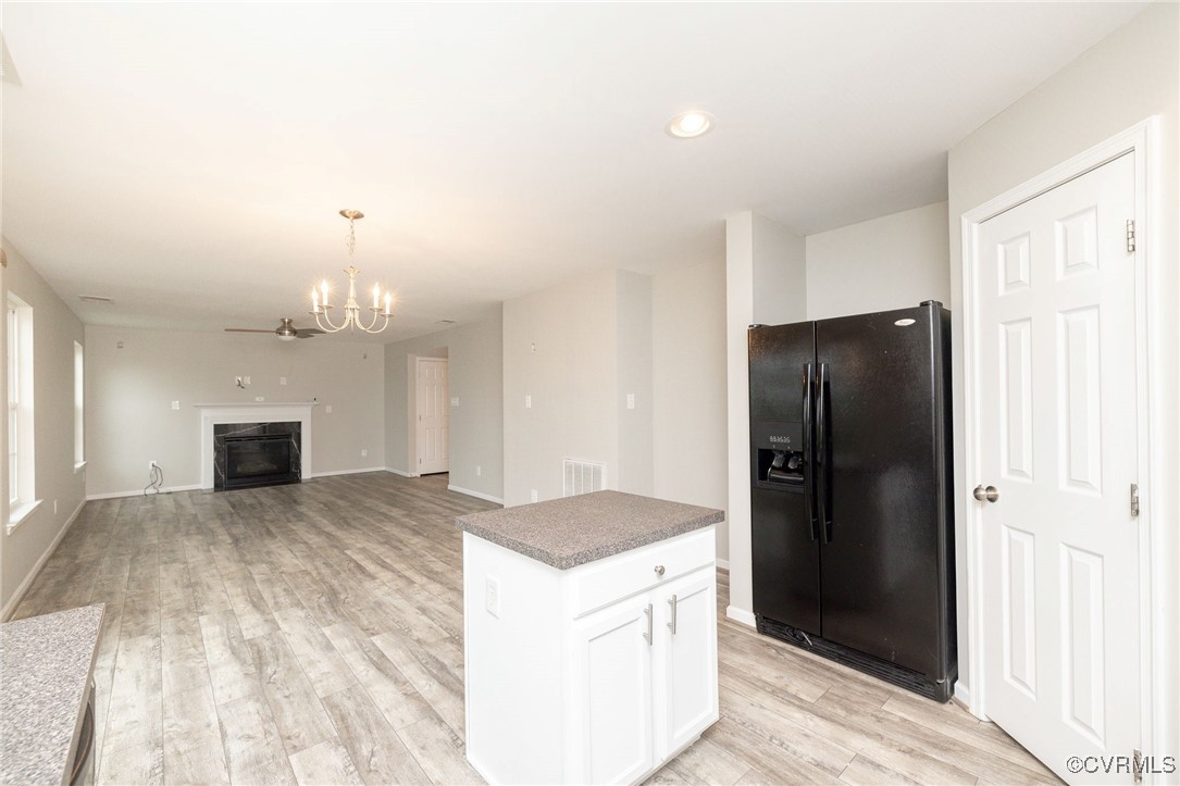 5125 Glenbeigh Road Richmond, VA 23234 - Photo 18 of 40 a kitchen with a refrigerator and a sink