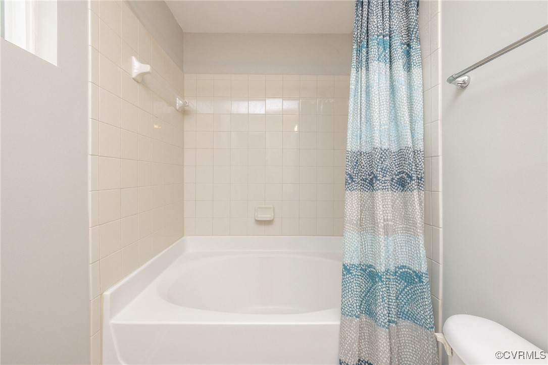 5125 Glenbeigh Road Richmond, VA 23234 - Photo 33 of 40 a bathroom with a bathtub and shower