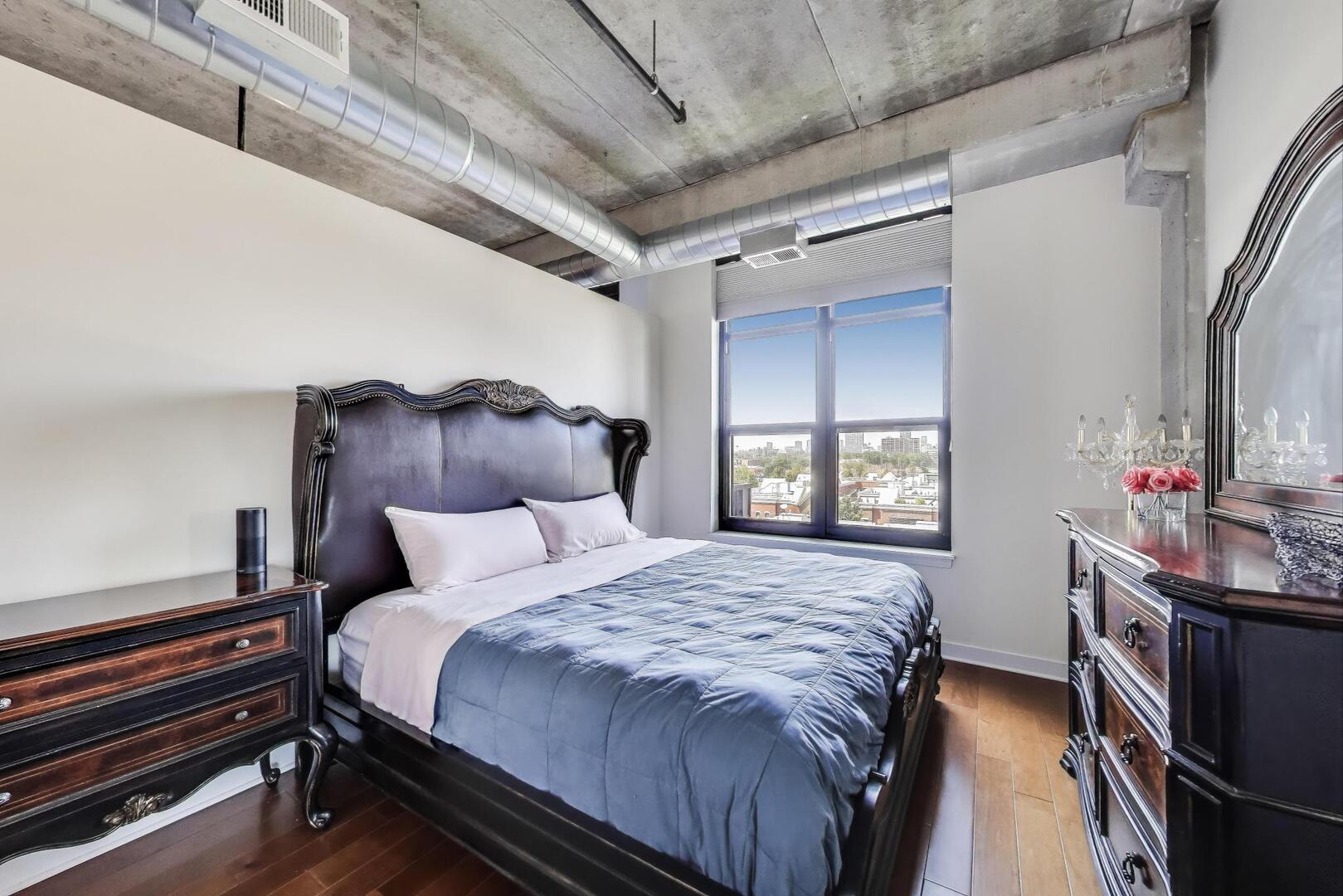 833 West 15th Place, Unit 606W Chicago, IL 60608 - Photo 14 of 47 a bedroom with a bed and a window