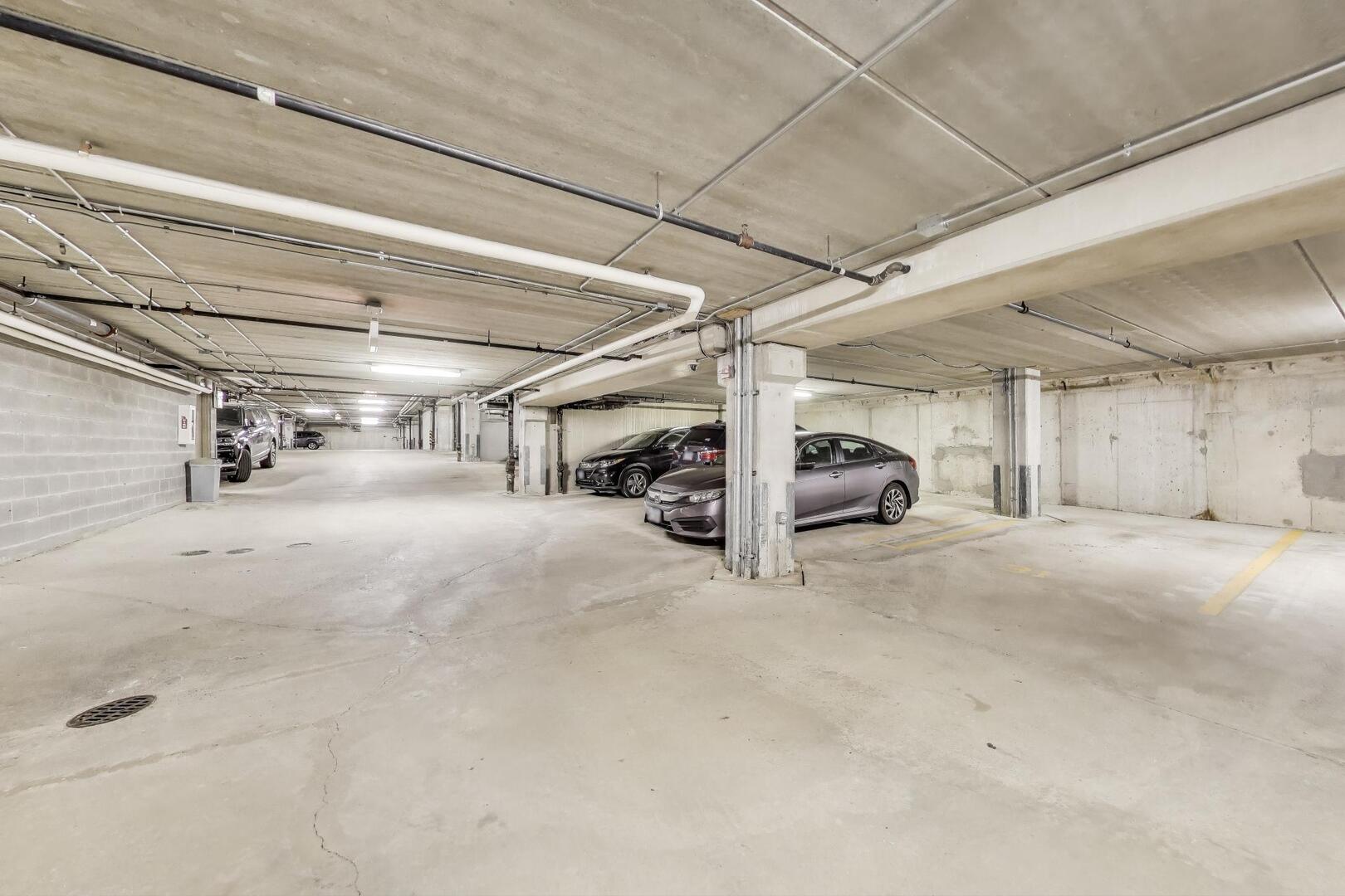 833 West 15th Place, Unit 606W Chicago, IL 60608 - Photo 36 of 47 a view of parking garage with cars