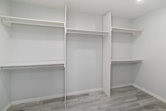 a view of an empty walk in closet
