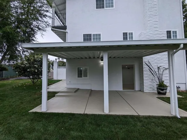a view of a porch with garden