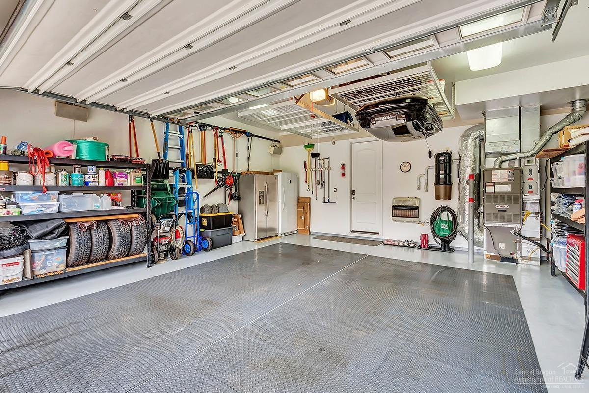 61107 Aspen Rim Lane Bend, OR 97702 - Photo 20 of 24 This home's impeccable garage boasts cus