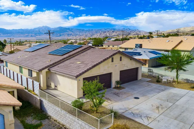 a buildings view with a backyard space