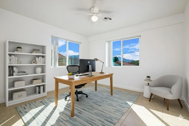 a kitchen with stainless steel appliances granite countertop a refrigerator stove top oven and sink