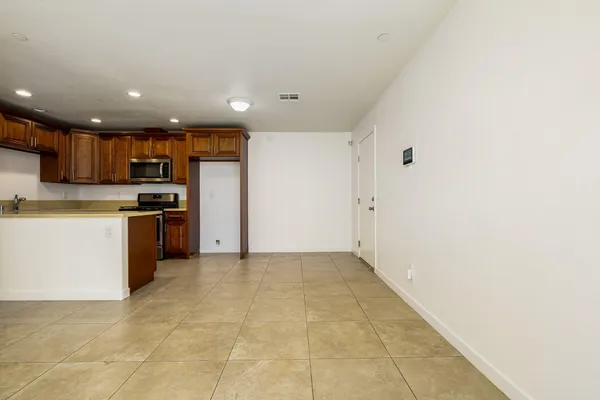 a kitchen with a stove and a microwave