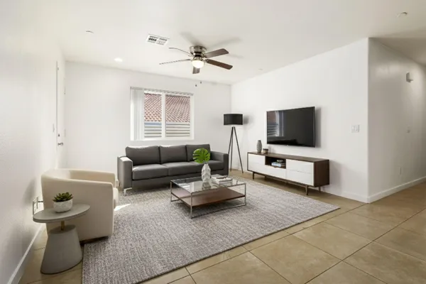 a view of a workspace with furniture and a workspace