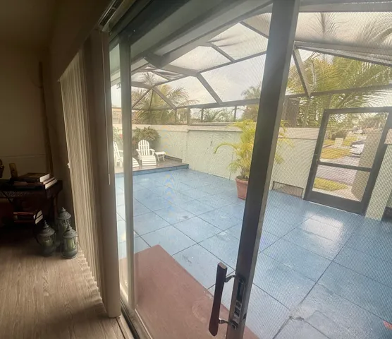 a view of a hardwood floor and a sink