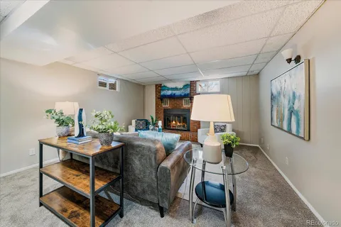 a room with furniture a window and a table