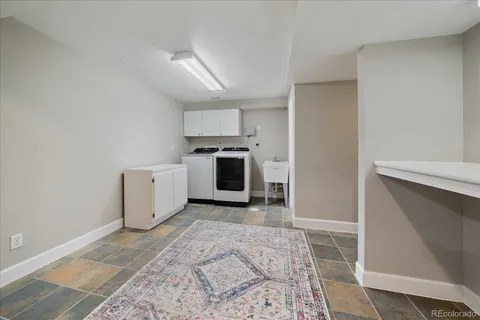 a kitchen with a stove and a refrigerator