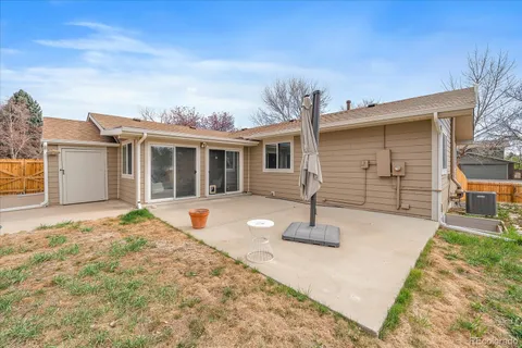 front view of a house with a patio