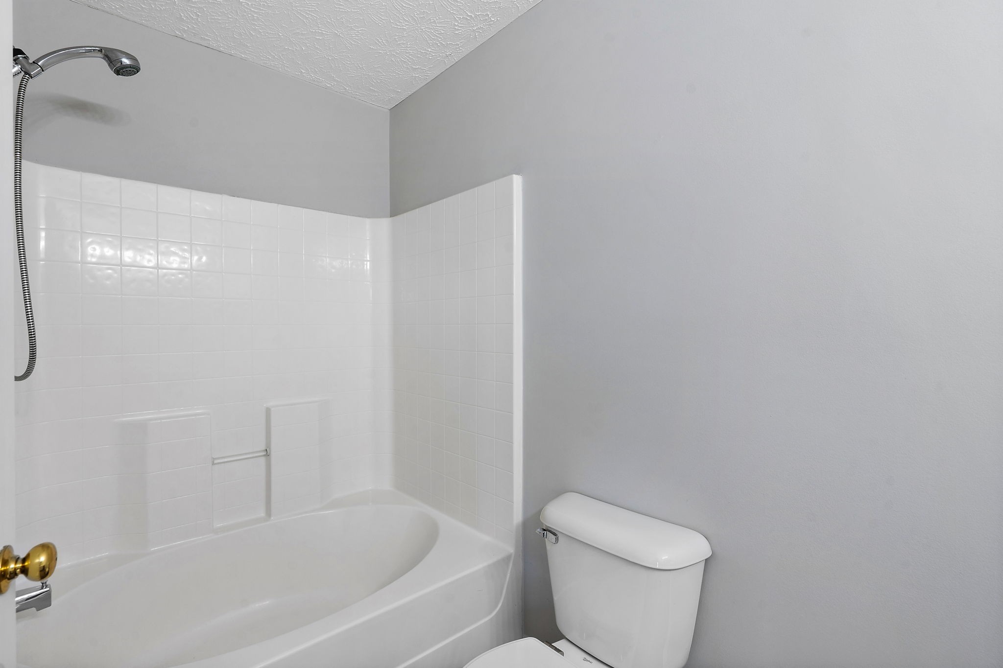 3253 Harpeth Springs Drive Nashville, TN 37221 - Photo 17 of 21 a white toilet sitting next to a bath tub