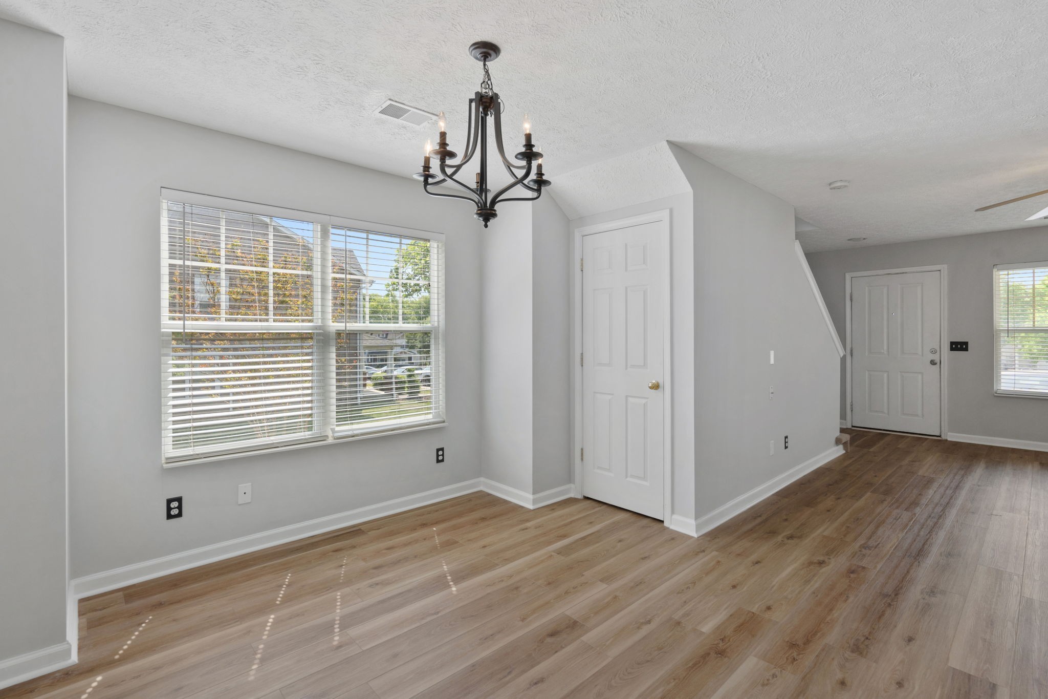 3253 Harpeth Springs Drive Nashville, TN 37221 - Photo 6 of 21 a view of an empty room with wooden floor and a window