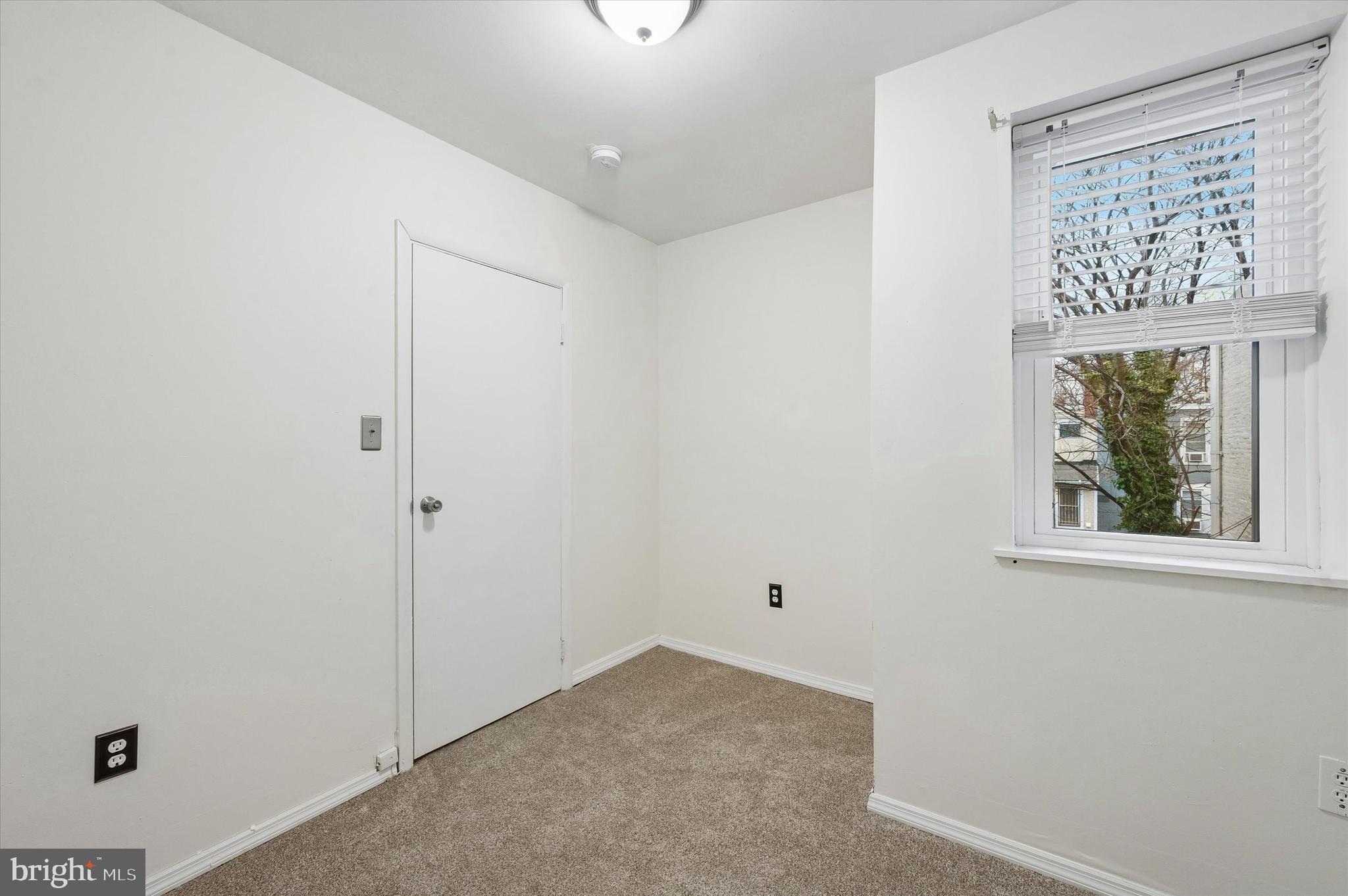 6129 Spruce Street Philadelphia, PA 19139 - Photo 17 of 18 a view of an empty room with a window