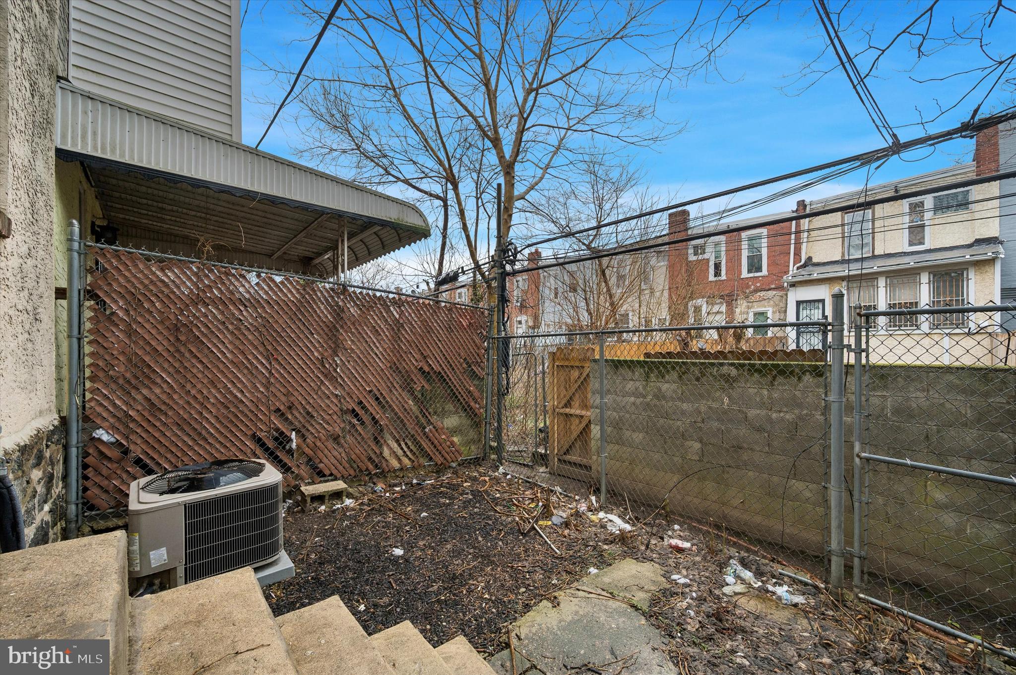 6129 Spruce Street Philadelphia, PA 19139 - Photo 18 of 18 a view of a house with a backyard