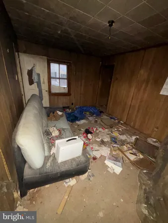 a room with furniture and window