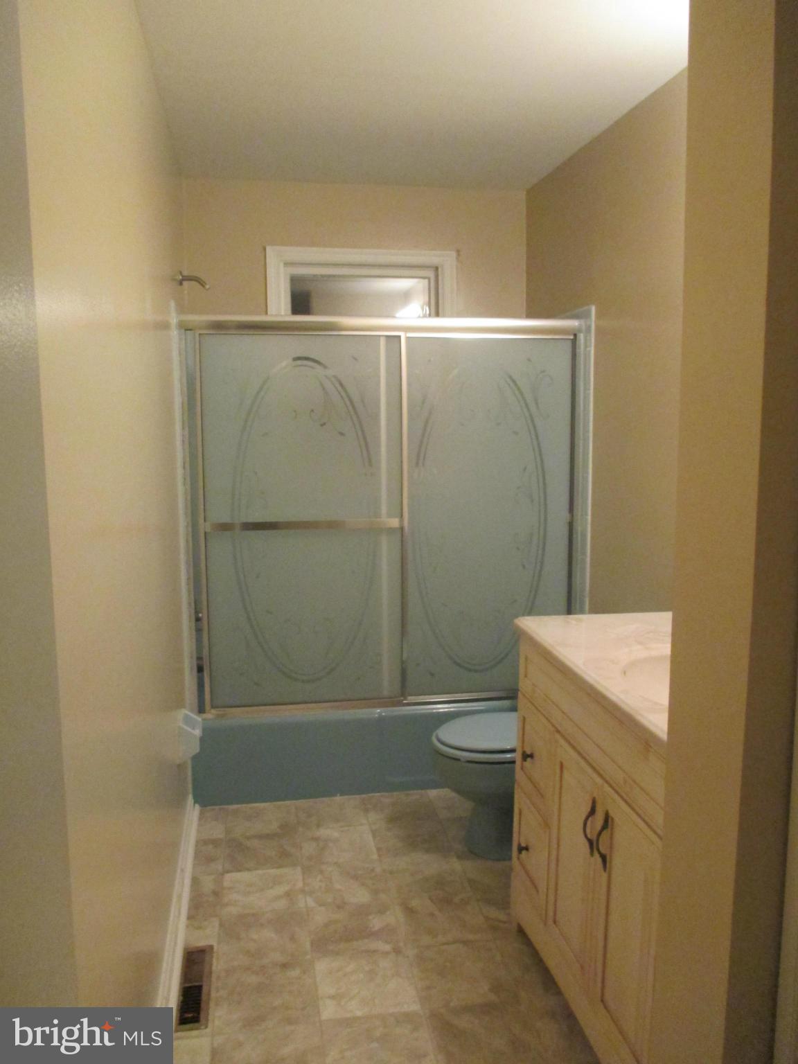 19706 Trunk Road White Hall, MD 21161 - Photo 11 of 19 a bathroom with a toilet and a shower