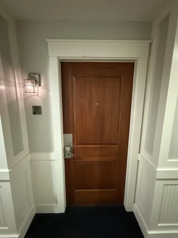 an ocean view with lots of green space