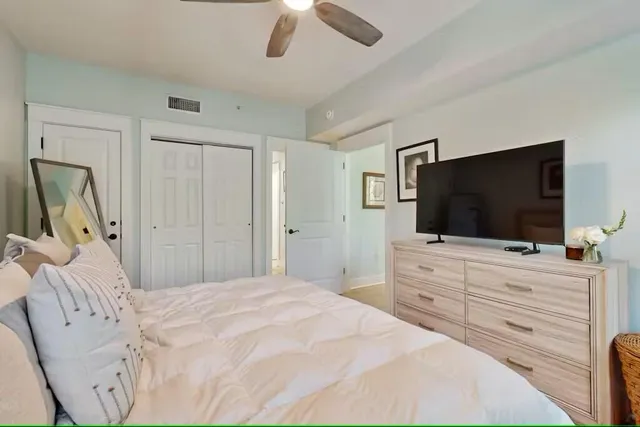 a kitchen with stainless steel appliances granite countertop a stove microwave and refrigerator