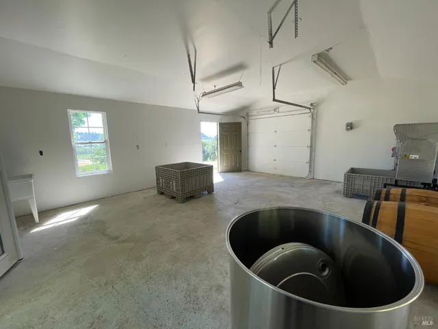 a kitchen with a sink a washer and dryer