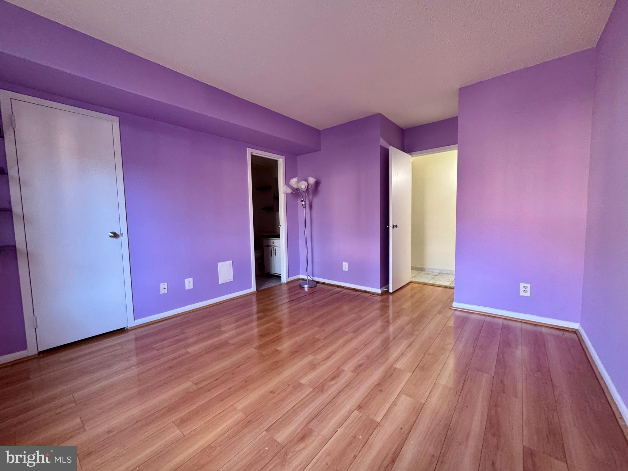 2247 Castle Rock Square, Unit 1B Reston, VA 20191 - Photo 21 of 26 a view of empty room with wooden floor