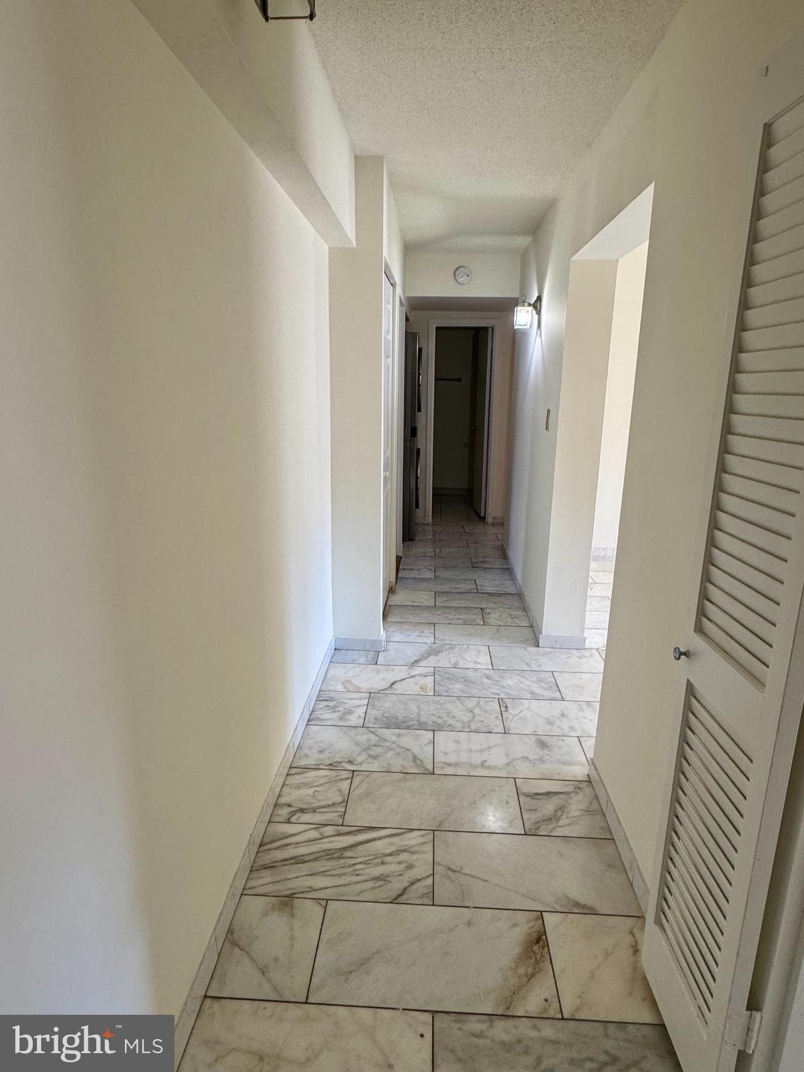 2247 Castle Rock Square, Unit 1B Reston, VA 20191 - Photo 3 of 26 a view of a hallway