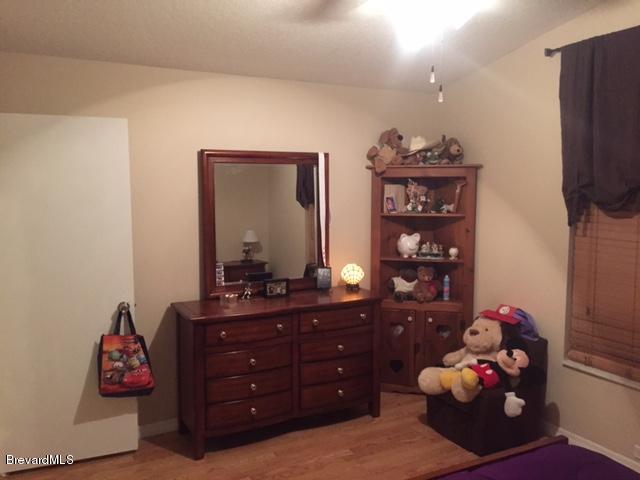 443 Tilhal Road Southwest Palm Bay, FL 32908 - Photo 2 of 18 Guest Bedroom 1