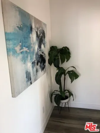 a vase of flowers sitting on a table