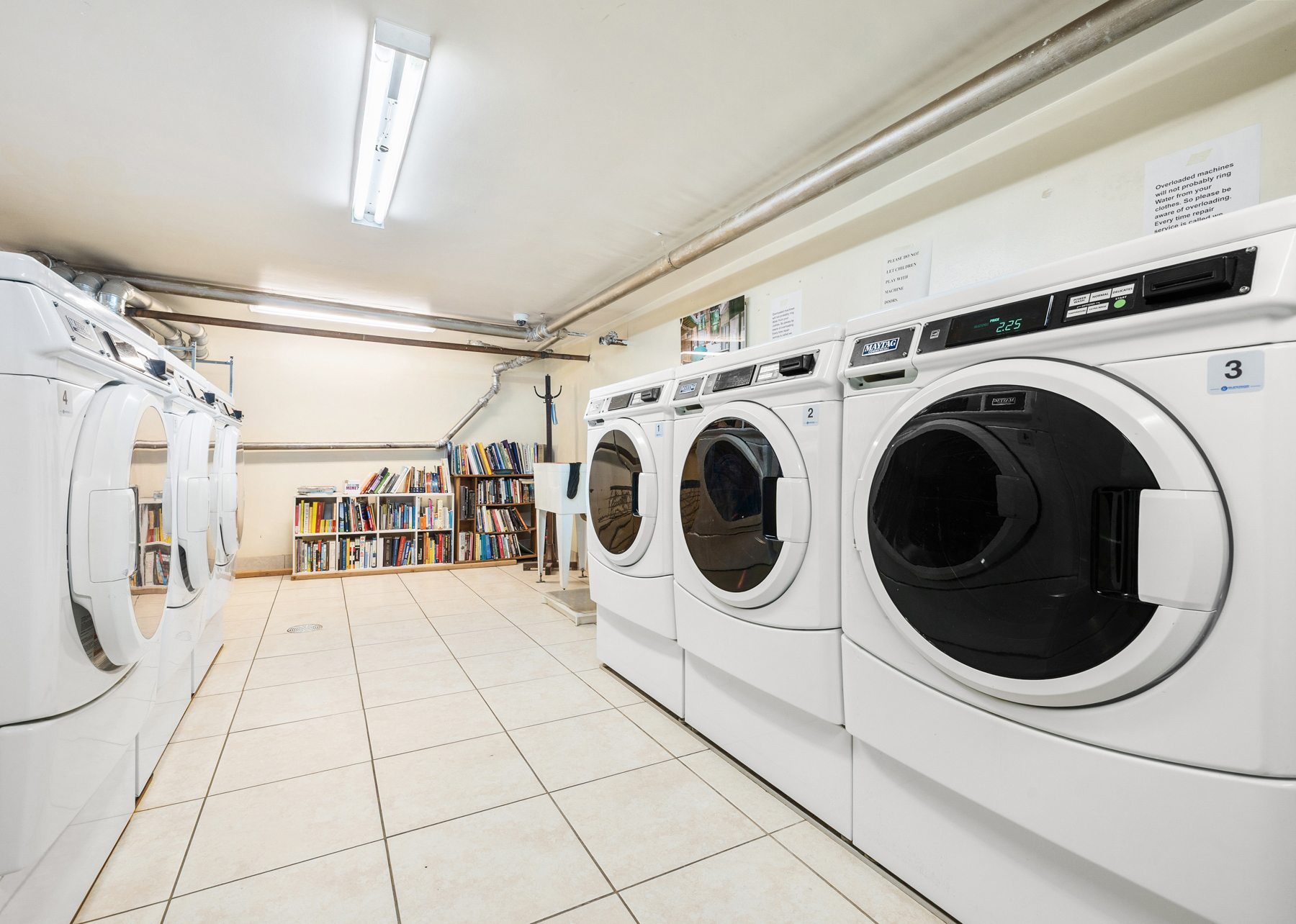 145-149 Morningside Avenue, Unit 1B Manhattan, NY 10027 - Photo 11 of 13 a utility room with dryer and washer