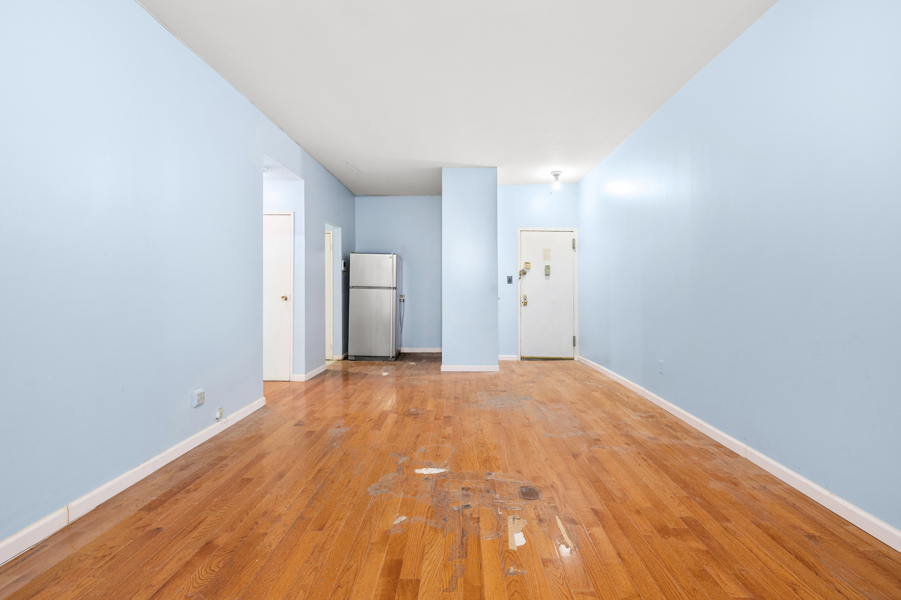 145-149 Morningside Avenue, Unit 1B Manhattan, NY 10027 - Photo 8 of 13 a view of empty room with wooden floor