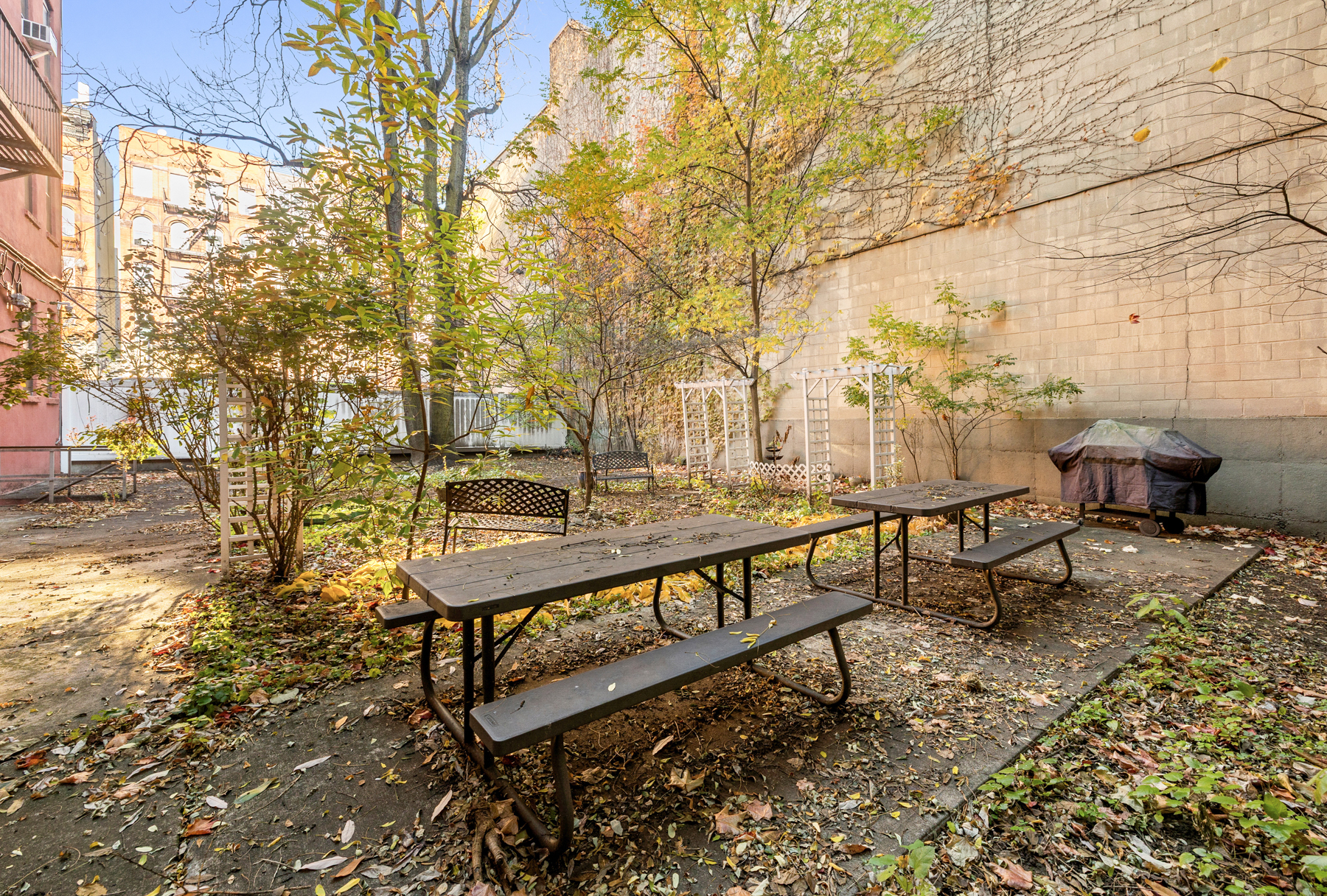 145-149 Morningside Avenue, Unit 1B Manhattan, NY 10027 - Photo 10 of 13 a view of a backyard with sitting area