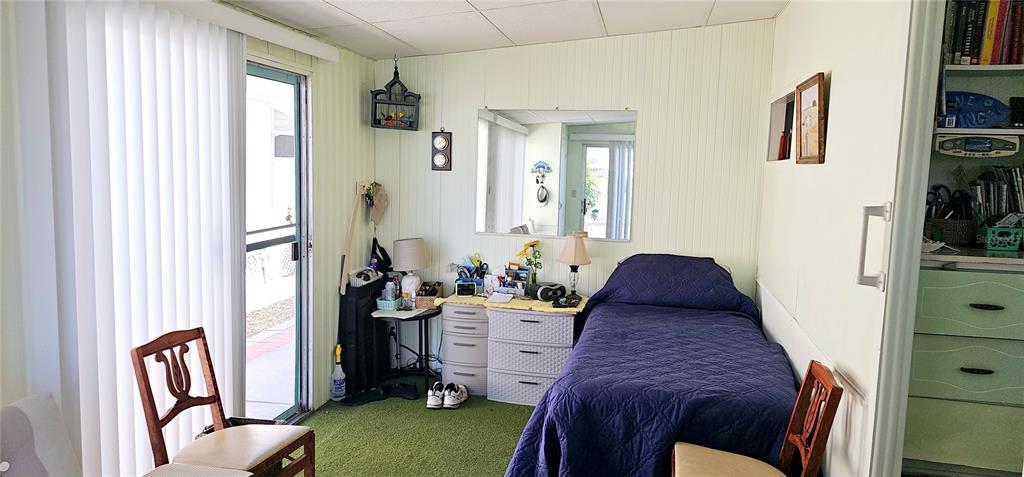 10315 Cortez Road West, Unit 281 Bradenton, FL 34210 - Photo 14 of 25 a living room with furniture and a window
