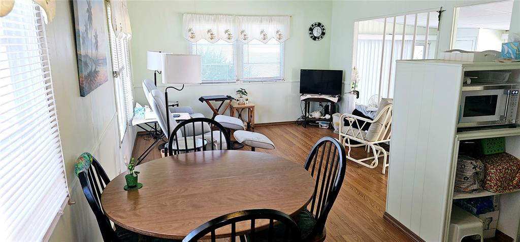 10315 Cortez Road West, Unit 281 Bradenton, FL 34210 - Photo 10 of 25 a view of a dining room with furniture and a window