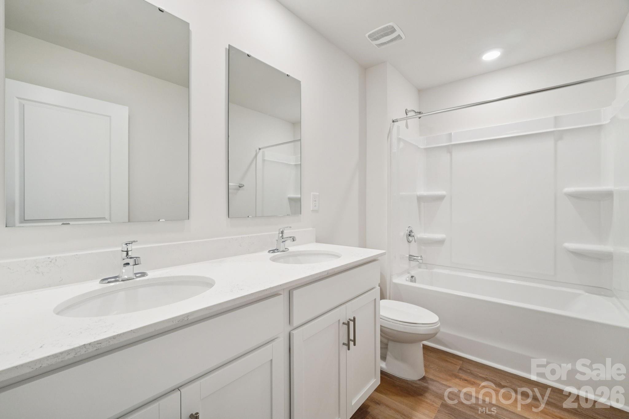 4559 Harris Elliot Road Lincolnton, NC 28092 - Photo 18 of 36 a bathroom with a sink a toilet and shower