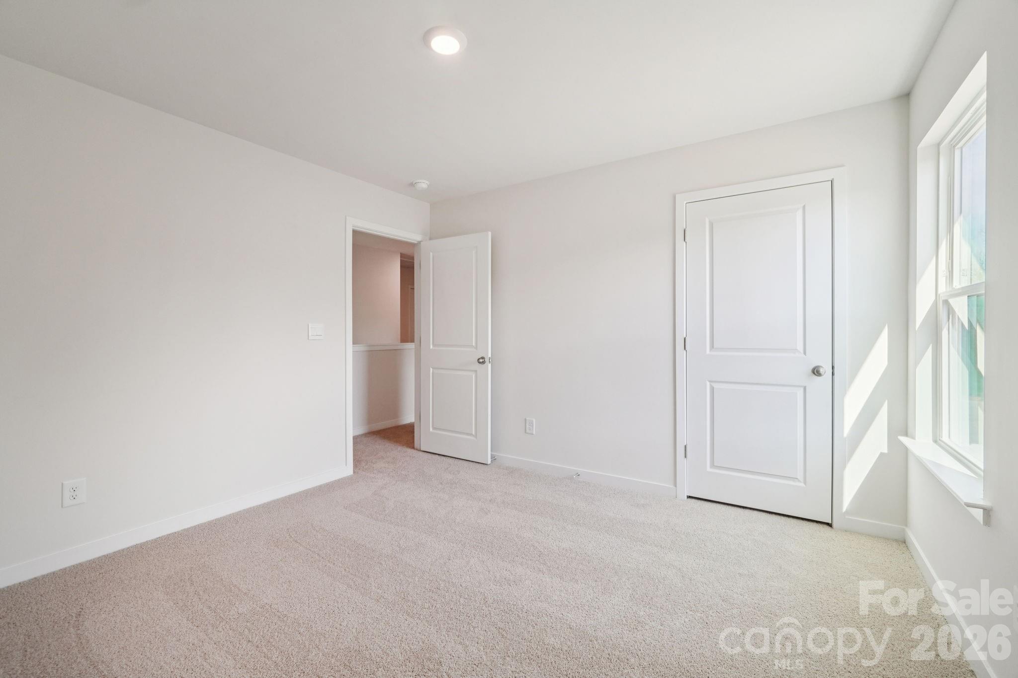 4559 Harris Elliot Road Lincolnton, NC 28092 - Photo 20 of 36 a view of an empty room and a window