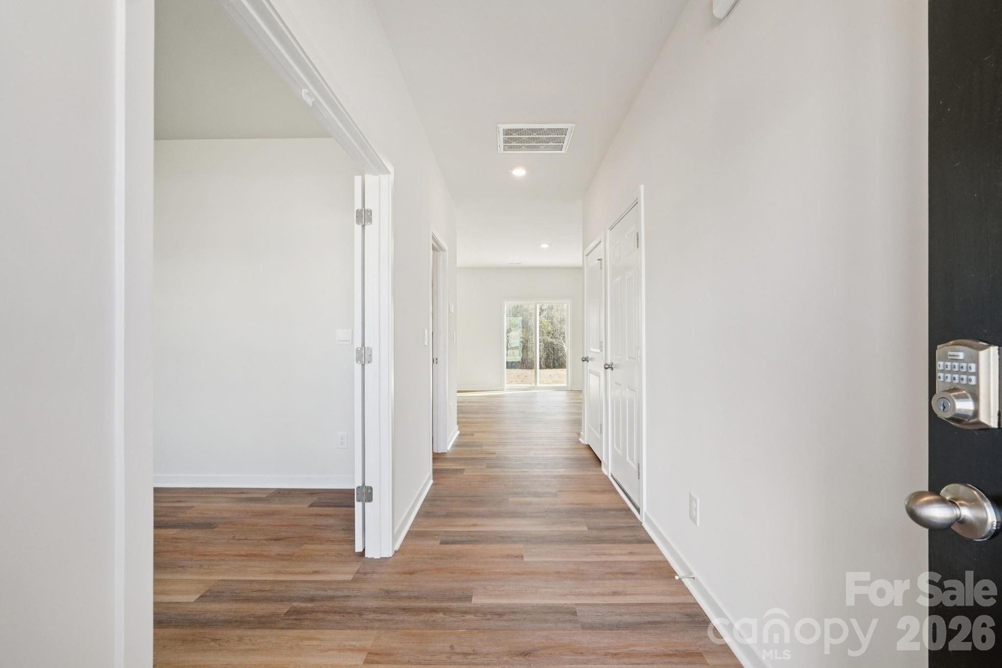 4559 Harris Elliot Road Lincolnton, NC 28092 - Photo 2 of 36 a view of a hallway with wooden floor