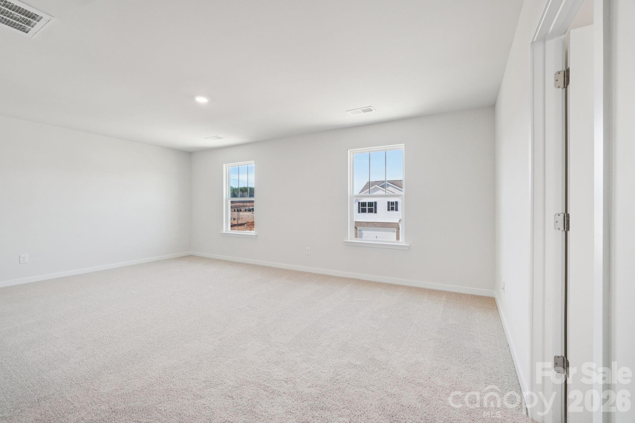 4559 Harris Elliot Road Lincolnton, NC 28092 - Photo 26 of 36 an empty room with windows